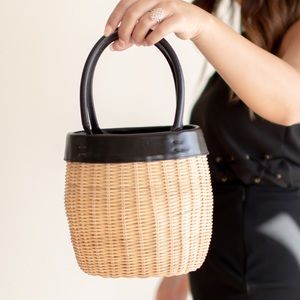 Rattan style bucket bag black accents